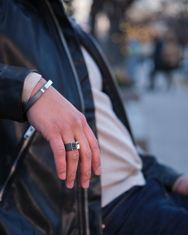 man wearing latest trends in jewelry