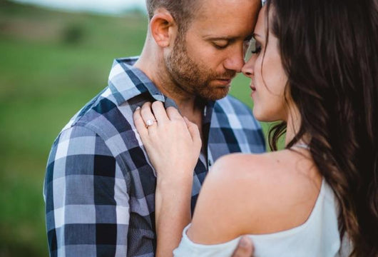 couple with a custom engagement ring from John Atencio