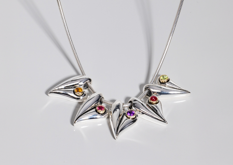 display of birthstone pendant as a wedding party gift idea