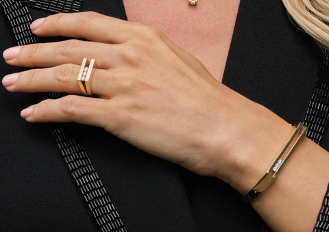 mother wearing diamond ring by John Atencio