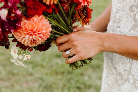 woman wearing a halo engagement ring